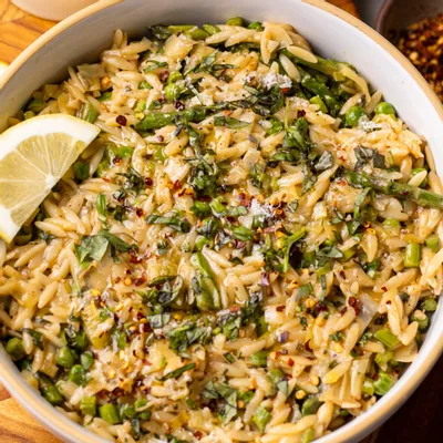 Recipe 'Garlic Parmesan Orzo With Peas and Asparagus'