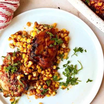 Recipe 'Baked Tomato Garlic Chicken Thighs with Corn'
