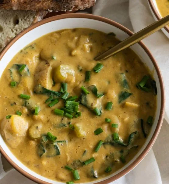 VEGAN CREAMY POTATO SOUP WITH BEANS AND SPINACH