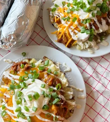 Recipe 'Loaded Pulled Pork Baked Potatoes!'