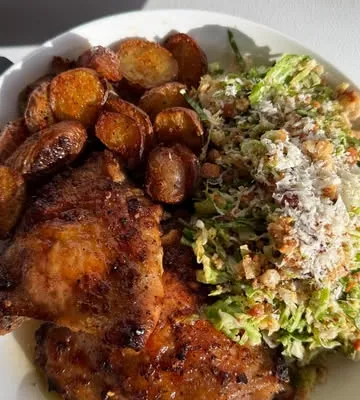 Recipe 'Lemon Herb Chicken Thighs and Caesar Salad'