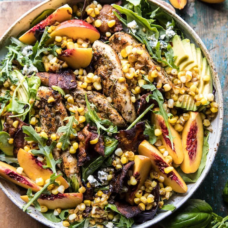 Rosemary Chicken, Caramelized Corn, and Peach Salad with Hot Bacon Vinaigrette