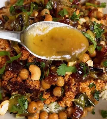 Recipe 'CAULIFLOWER & CHICKPEA VEGGIE RICE BOWLS WITH CITRUS & CHARRED SCALLIONS'