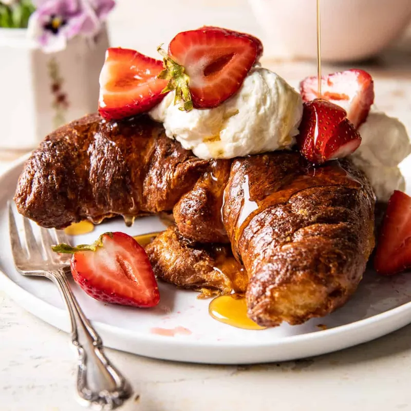 Baked Strawberry and Cream Stuffed Croissant French Toast