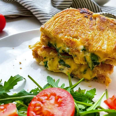 Recipe 'Caramelized Onion, Arugula, and Herbed Mayo Gourmet Grilled Cheese'