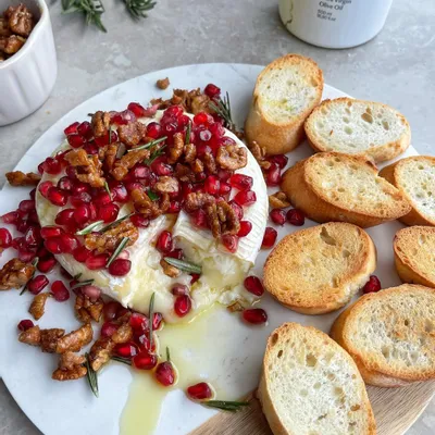 Recipe 'Baked Brie Cheese with Pomegranate, Candied Walnuts and Rosemary'