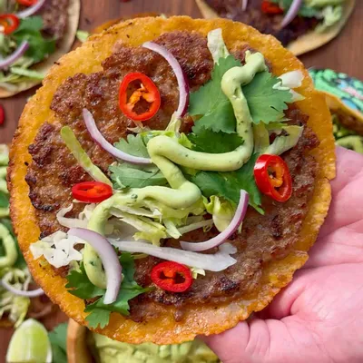 Recipe 'Crispy Pork Smash Tacos with Avocado Lime Crema'
