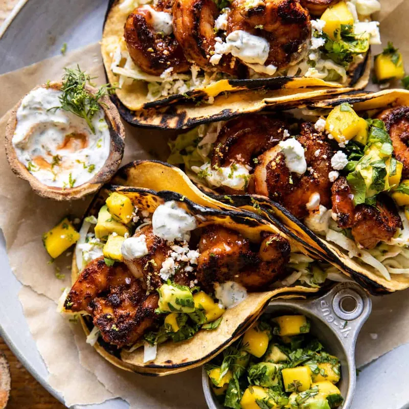 Chipotle bbq shrimp tacos with creamy ranch slaw from Half Baked Harvest