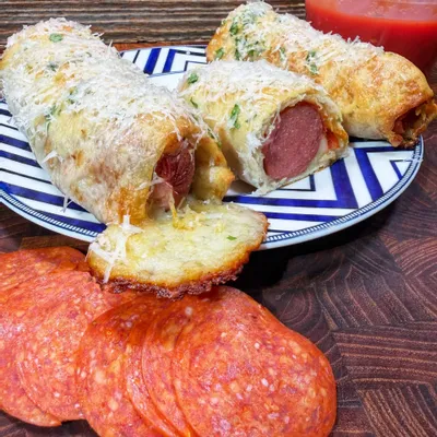 Recipe 'Delicious Pizza Pigs in a Blanket: Easy Recipe for a Fun Snack'