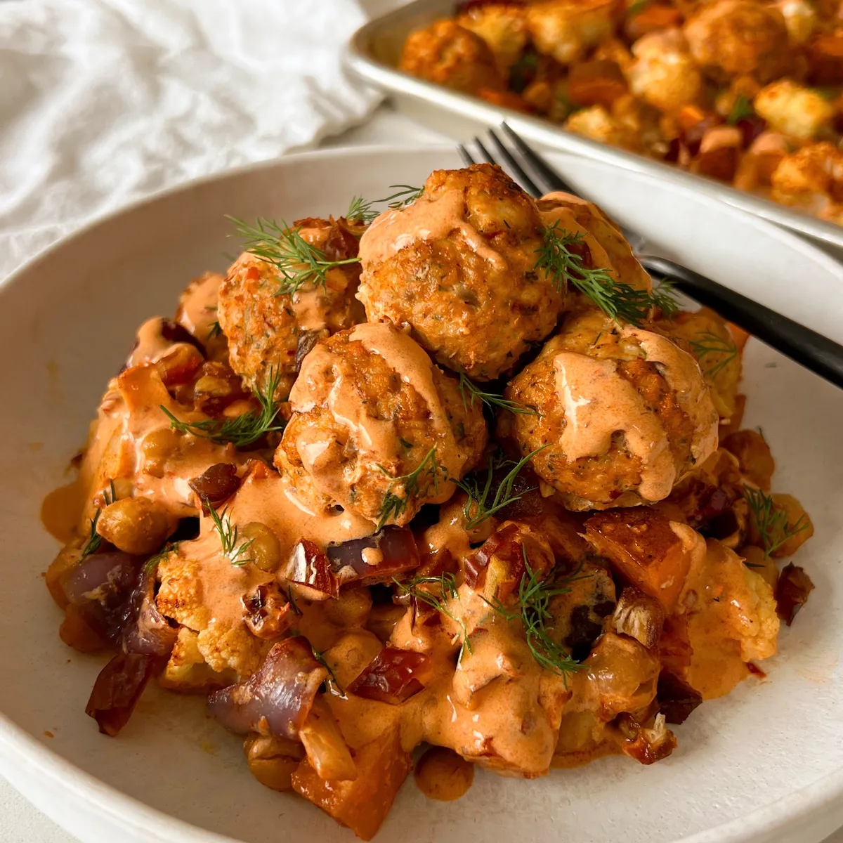 Sheet Pan Harissa Chicken Meatballs with Cauliflower and Chickpeas