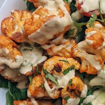 Recipe 'Buffalo Cauliflower with Cheesy Tahini Sauce'