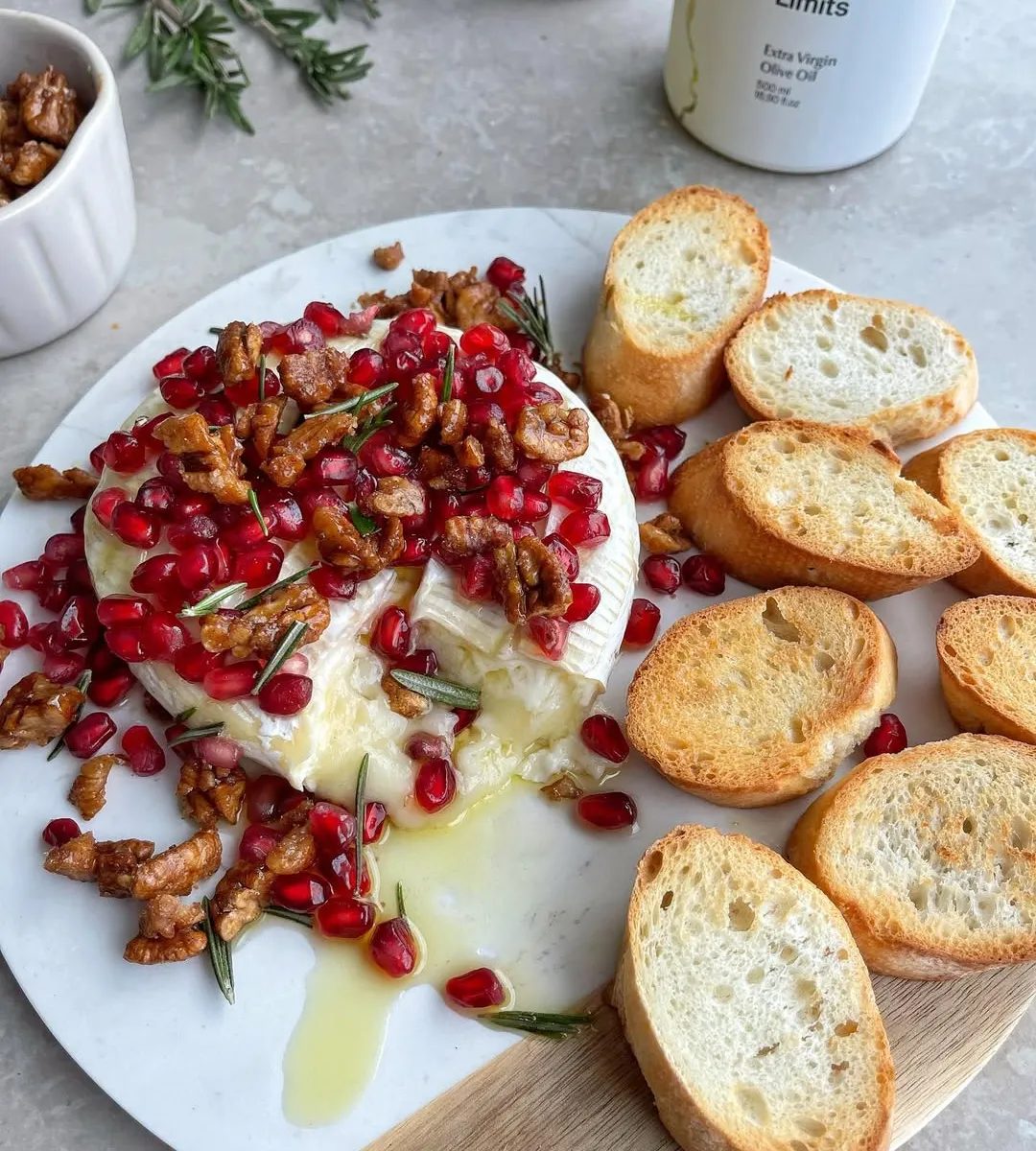 Baked Brie Cheese with Pomegranate, Candied Walnuts and Rosemary