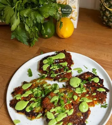 Recipe 'Zucchini + Corn Fritters with a Spicy Green Goddess Sauce'