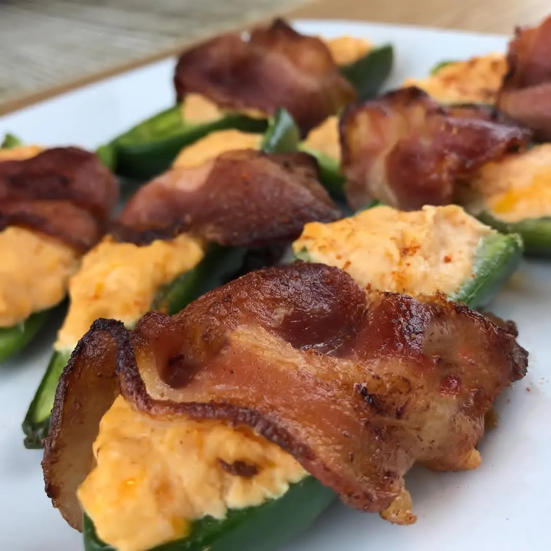 Buffalo Chicken Stuffed Jalapeños Wrapped in Bacon