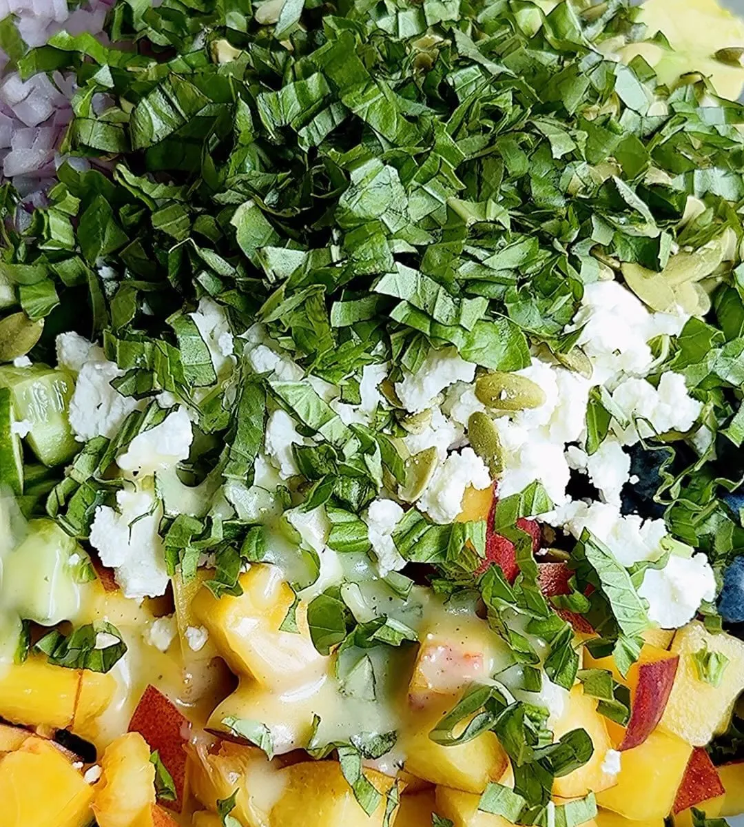 PEACH, BLUEBERRY & GOAT CHEESE SALAD WITH HONEY-LIME DRESSING