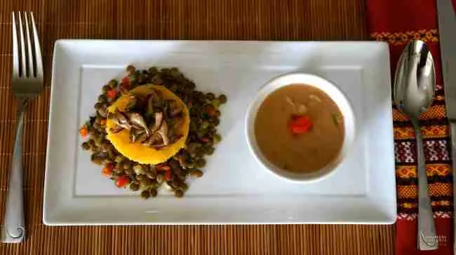 A Vegan meal, Polenta Herbed Cake, Ragout Lentils, Sautéed Shiitake Mushrooms with Butter Bean Puree